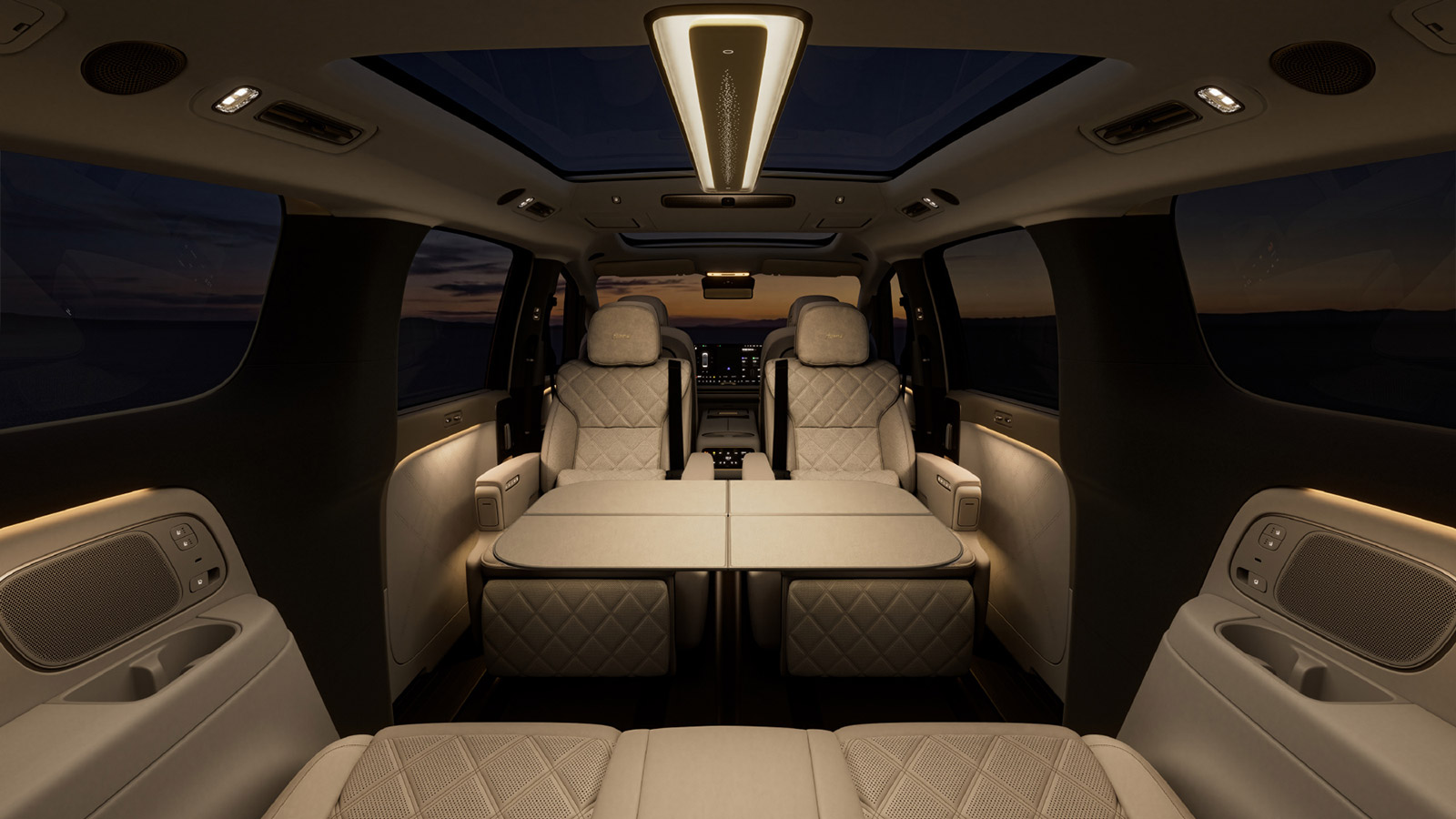 Interior of the next-generation Li Mega featuring lounge-style seating, a panoramic roof and a large ceiling-mounted main light.