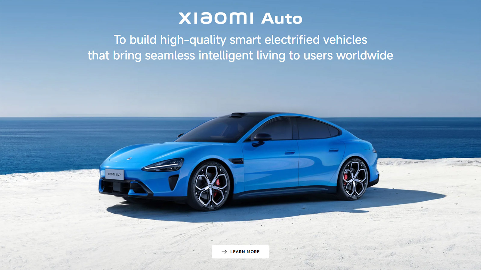 Blue Xiaomi SU7 sedan displayed against a seaside backdrop on the Xiaomi Auto international website.