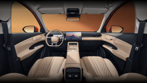 Interior of the Chery Fulwin T7 with beige seats, a digital instrument display and a large central touchscreen.