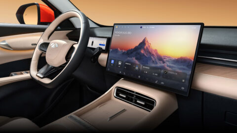 Close-up of the Chery Fulwin T7 cockpit showing a two-tone steering wheel, digital instrument display and large central touchscreen.