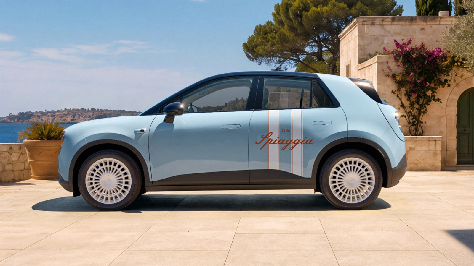 A light-blue Nio Firefly Club Spiaggia special edition with orange-and-white striped decals and white multi-spoke wheels, parked beside the coast.
