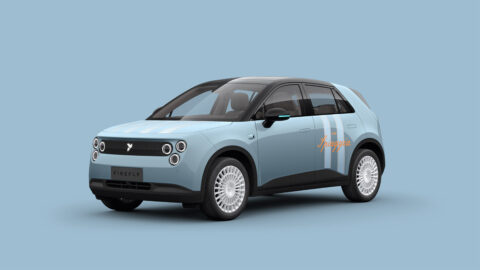 Front three-quarter view of the light-blue Nio Firefly Club Spiaggia special edition with striped decals and white multi-spoke wheels.