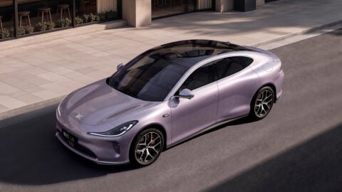 Front three-quarter view of the all-new IM L6 in a light purple exterior finish.