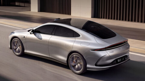 Rear three-quarter view of the all-new silver IM L6 showing its full-width taillight.