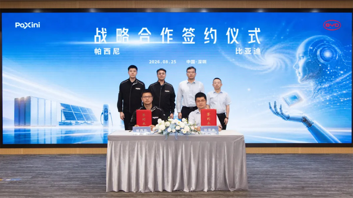 Representatives from BYD and PaXini Tech pose with signed agreements at a strategic partnership ceremony in Shenzhen.