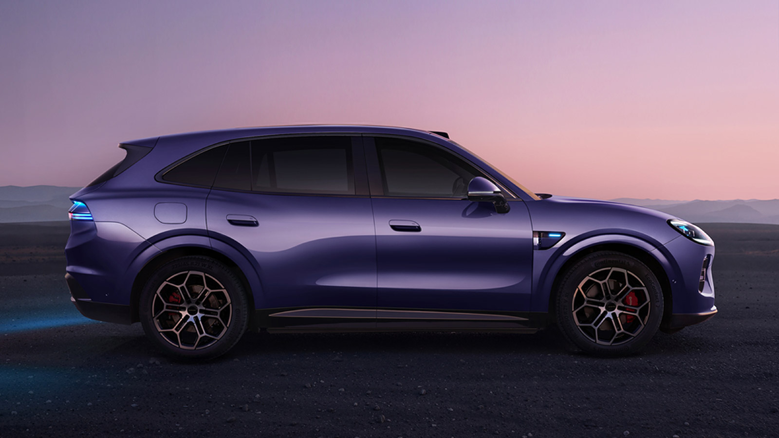 Side profile of a purple Aistaland GX7 SUV against a mountainous sunset backdrop.