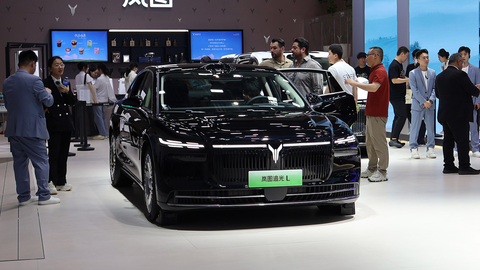 A black Voyah Passion L sedan on display at the 2026 Beijing auto show.