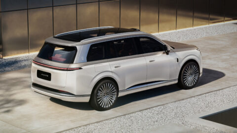 Elevated rear three-quarter view of Avatr's 9-series SUV, showing a panoramic glass roof, roof spoiler and full-width rear light bar.