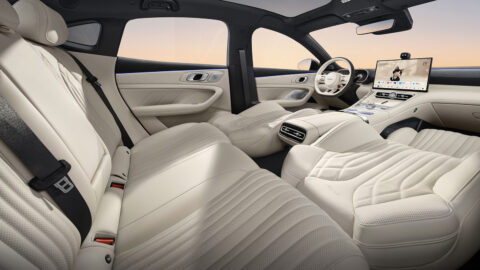 Beige interior of the Geely Galaxy TT showing reclined front seats, the rear bench and rear air vents.