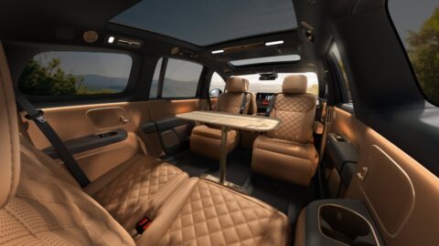 Li i9 rear cabin with face-to-face seating, fold-out tables and a panoramic glass roof.