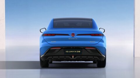 Rear view of a blue Volkswagen ID. UNYX 09, showing its slim taillights and black lower bumper.