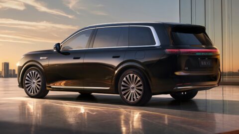 Rear three-quarter view of a dark-colored Epicland X9 SUV, showing its full-width taillight and tinted windows.