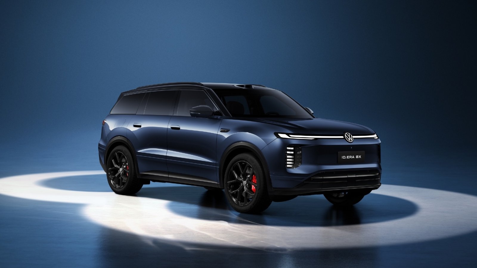 Blue Volkswagen ID. ERA 8X extended-range SUV viewed from the front three-quarter angle, with a black roof, black wheels and red brake calipers.