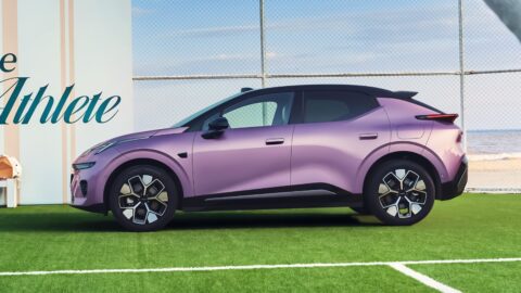 Side view of a purple Lynk & Co 20 electric SUV parked on a tennis court.