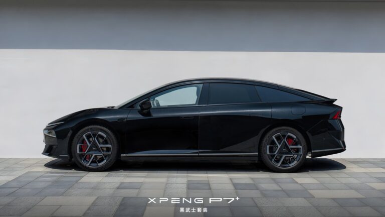 Side profile of the black Xpeng P7+ Black Knight package against a plain wall, highlighting its fastback silhouette, flush door handles, 20-inch wheels and red brake calipers.