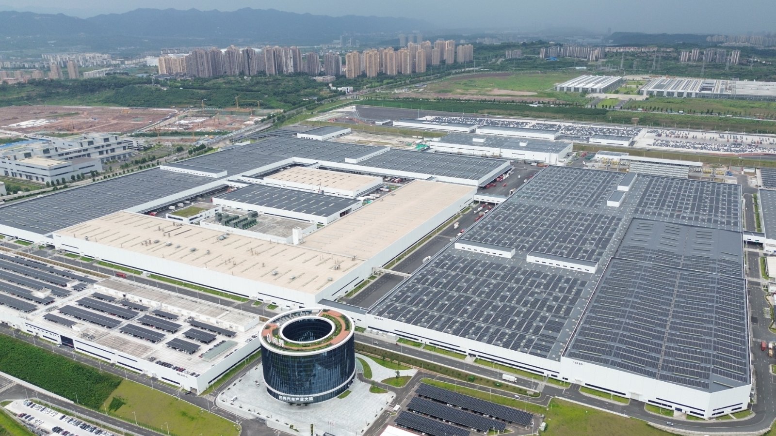 Aerial view of the Seres factory in Chongqing, with solar panels covering much of its rooftops.