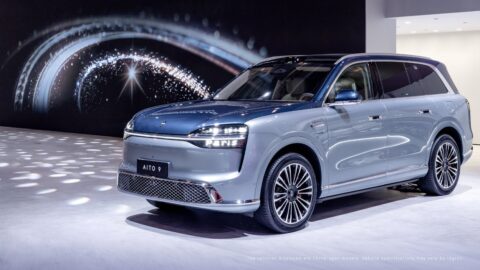 The AITO 9 on display at the 2026 Paris Motor Show, showcasing AITO's "Intelligence Redefining Luxury" philosophy.