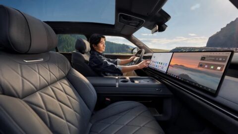 Volkswagen ID. ERA 8X front cabin with quilted seats, dual dashboard screens and a panoramic glass roof.