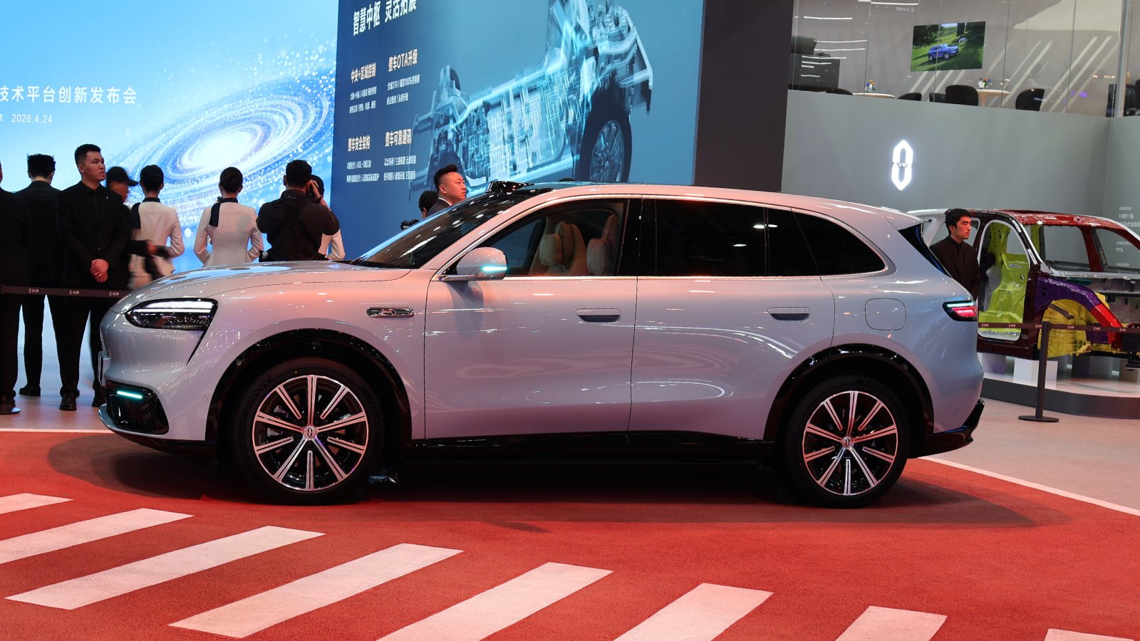 Side view of a silver Aito M6 SUV on display at the 2026 Beijing Auto Show.
