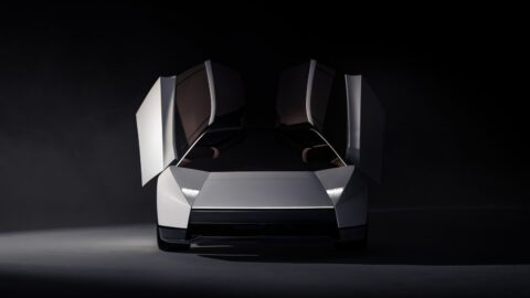 Front view of the Tesla Roadster with both doors raised.