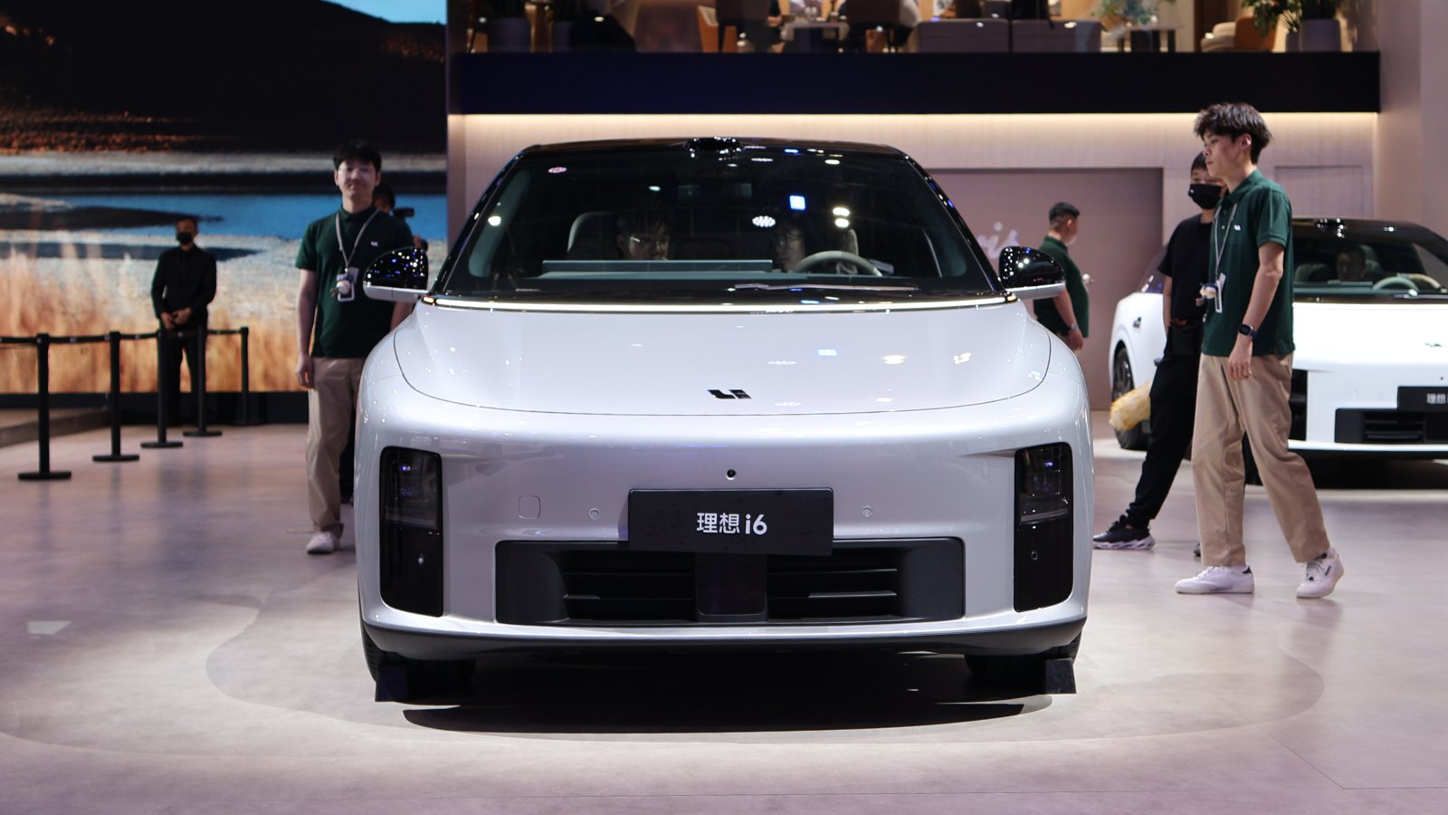 Front view of a silver Li i6 electric SUV on display at the Beijing auto show.