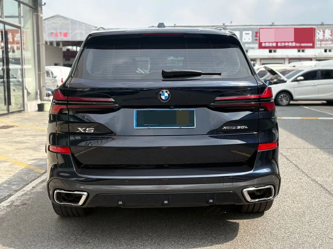 BMW 2023 X5 xDrive30Li 48V 2.0T exclusive m sports obsidian night suit automatic gear 12