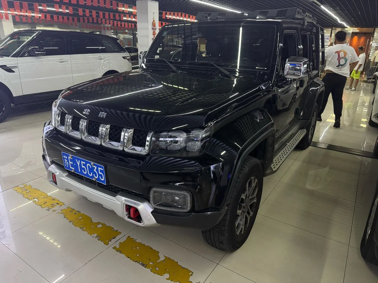 Открыть галерею: Beijing 2023 BJ40 2.0T Four-wheel Drive Ring Tower Champion Edition Automatic Gear