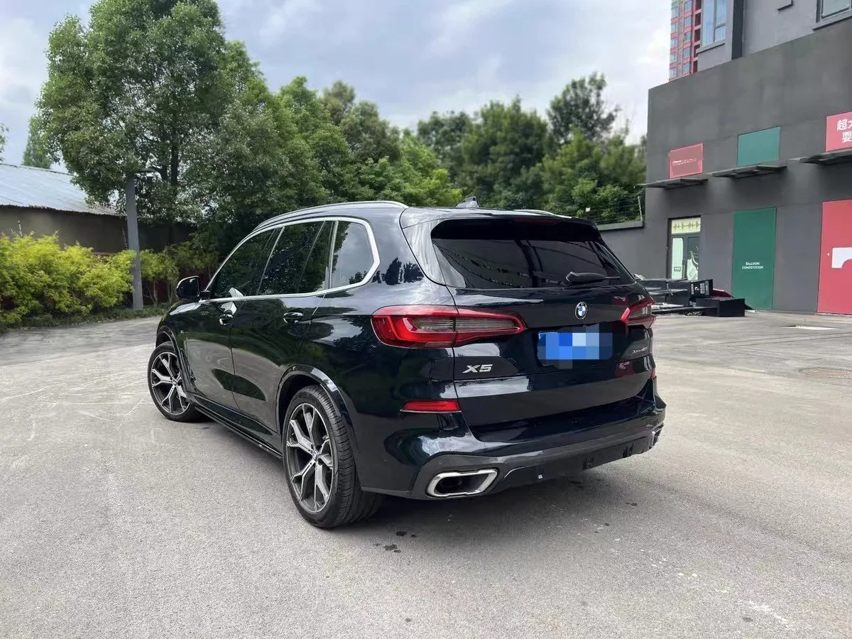 BMW 2023 X5 xDrive30Li 48V 2.0T exclusive m sports obsidian night suit automatic gear 7