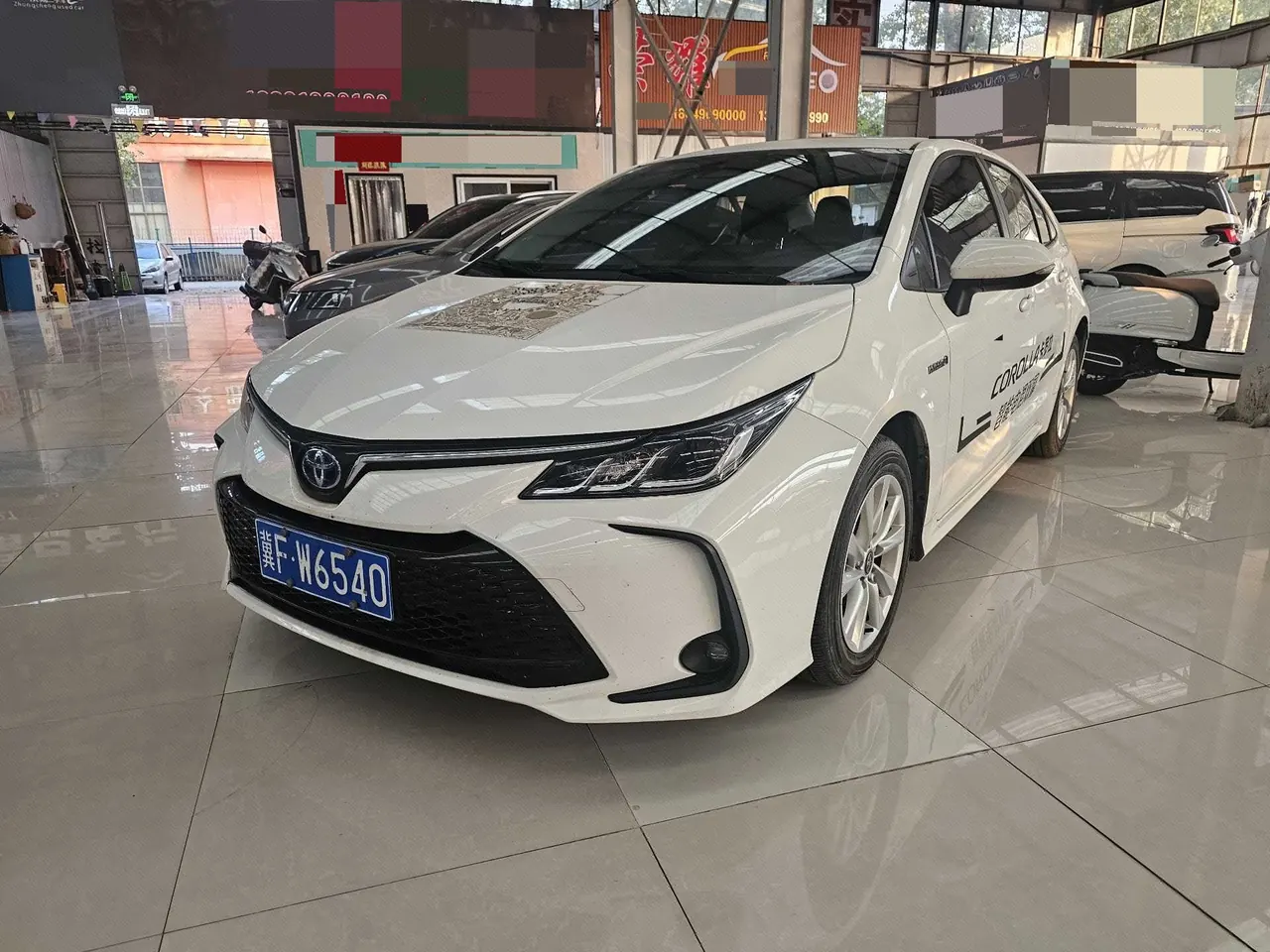 Открыть галерею: Toyota 2023 Corolla Double Engine 1.8 Stepless Intelligent Electric Hybrid Elite Automatic Gear