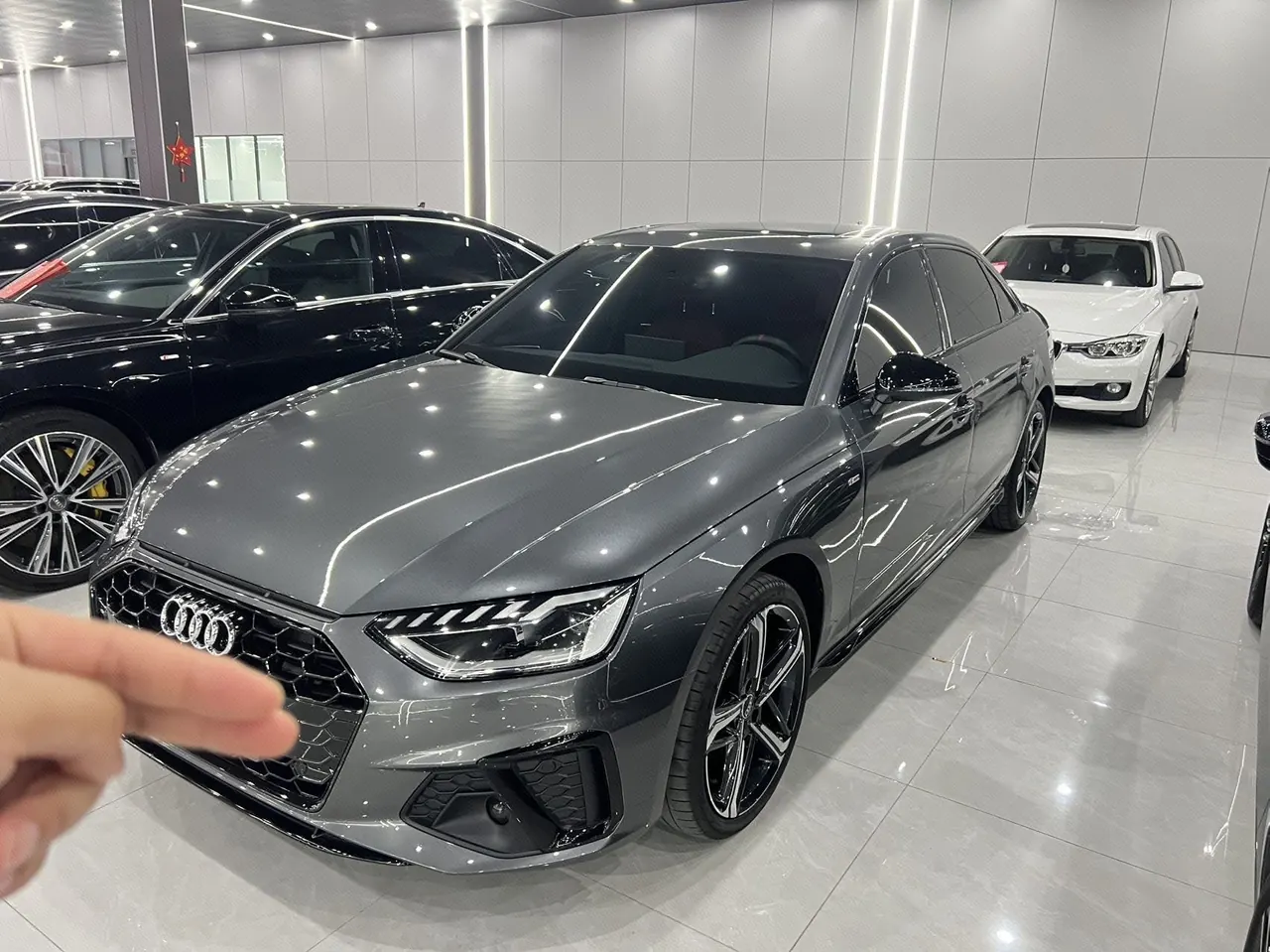 Открыть галерею: Audi 2025 A4L 2.0TFSI 40TFSI 2 million‑vehicle celebration edition, luxury sporty model, automatic transmission