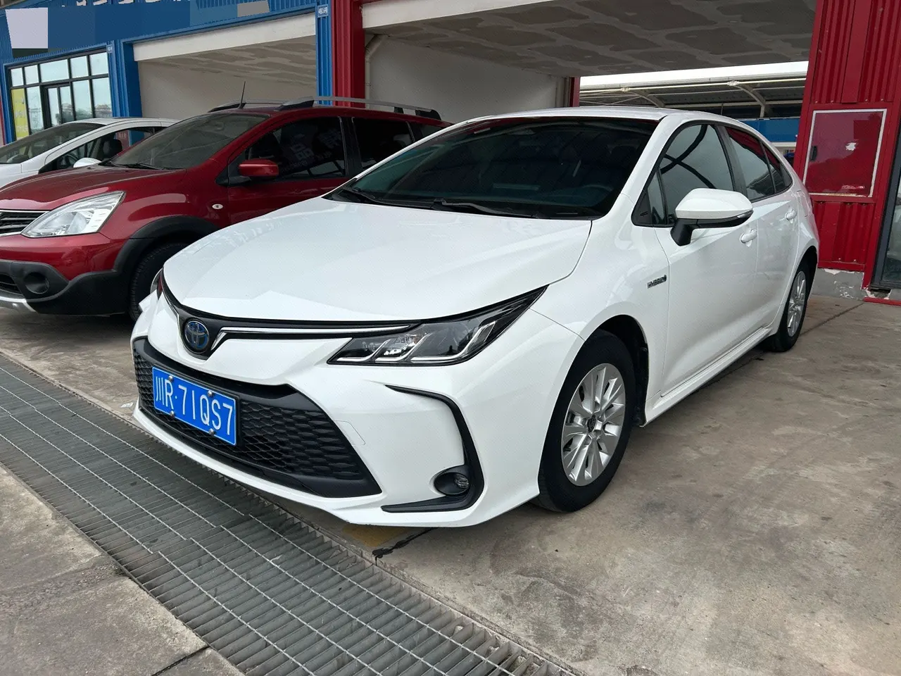 Открыть галерею: Toyota 2023 Corolla Double Engine 1.8 Stepless Intelligent Electric Hybrid Pioneer Edition Automatic Gear