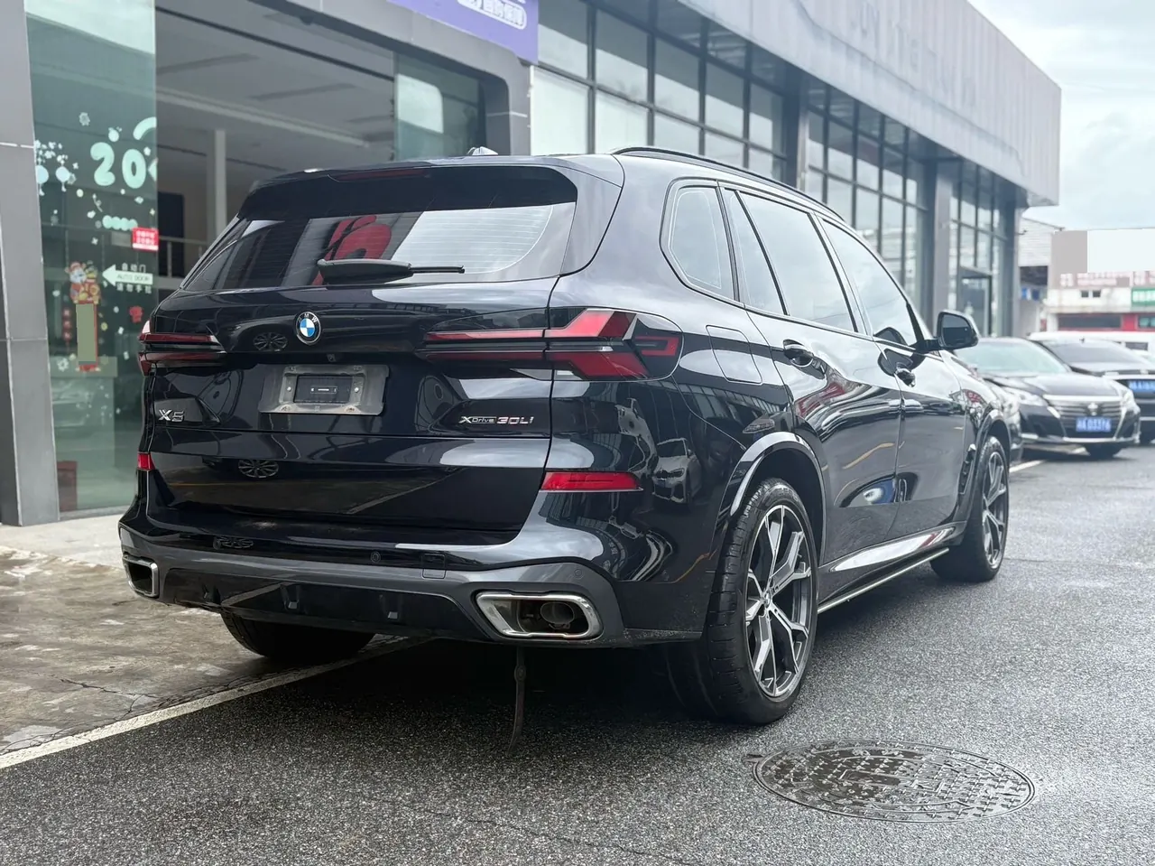 BMW 2023 X5 xDrive30Li 48V 2.0T exclusive m sports obsidian night suit automatic gear 13
